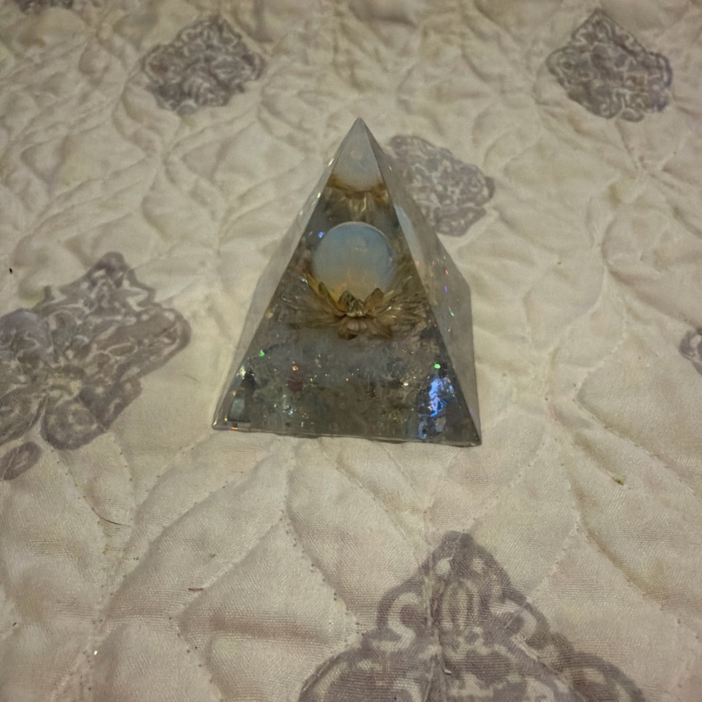 Snowy Lotus Flower inside Chakra Pyramid made of resin